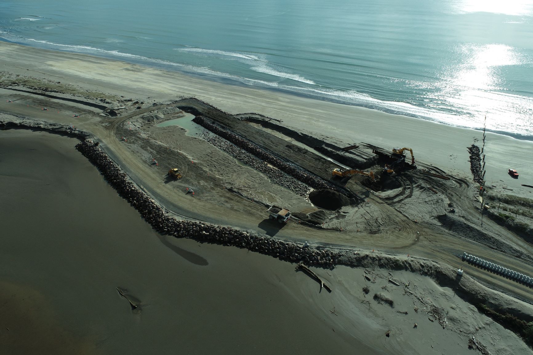 Image of breakwater and construction at harbour development site July 2021