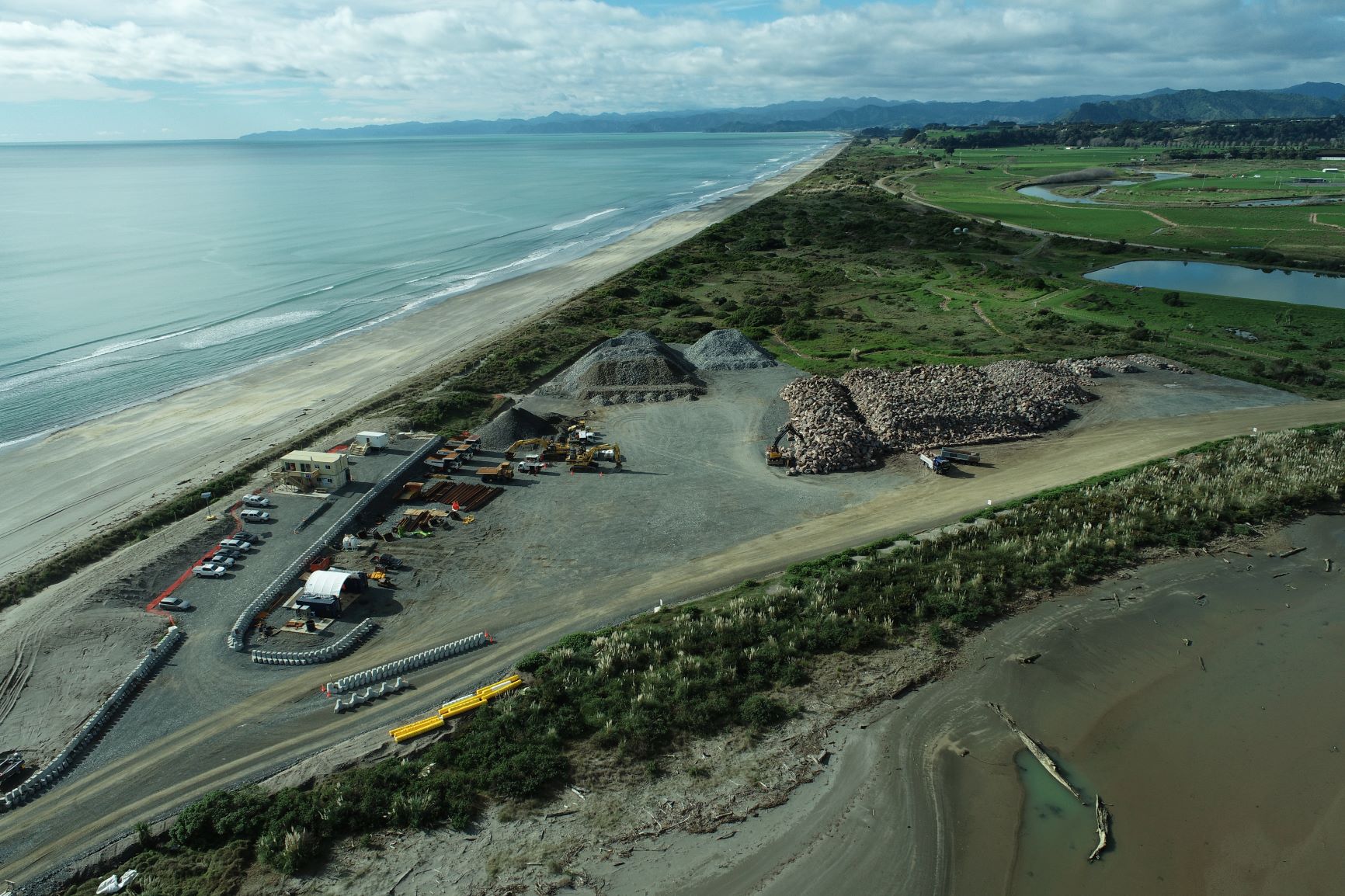 Image of Stockpiles at harbour development site July 2021