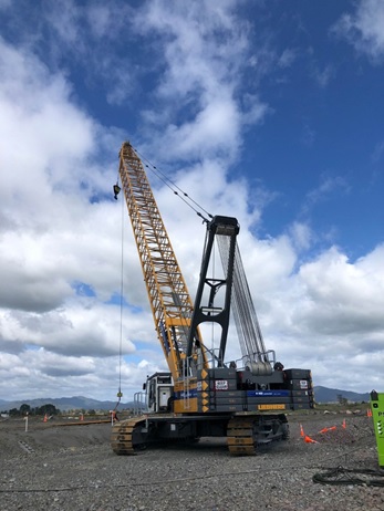 Large Liebherr 895 crane working at the Opotiki Harbour Development site