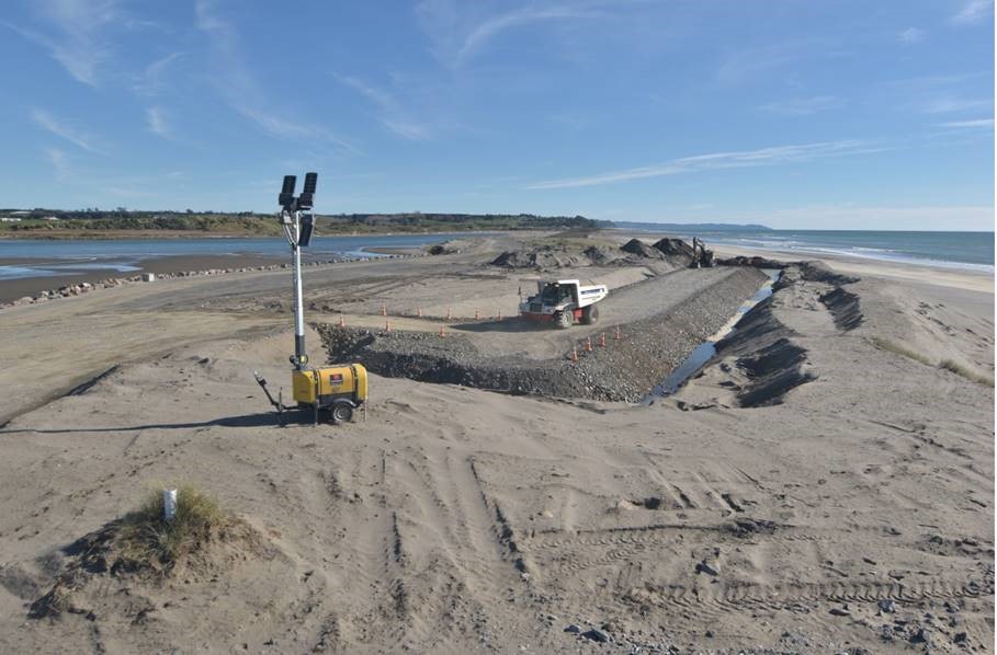 Picture of a truck working on the harbour walls on the Opotiki harbour development