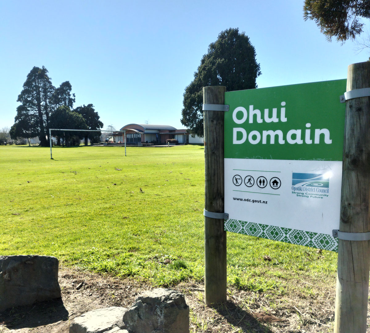 Photo of a sign saying Ohui Domain located in the domain that the BayTrust Pavilion is located on.