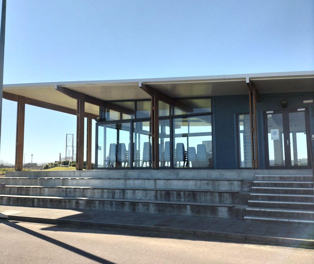 Photo of the outside of Memorial Park Pavilion showing grandstand style concrete seating